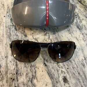 Prada Gray Sunglasses with Black Lenses